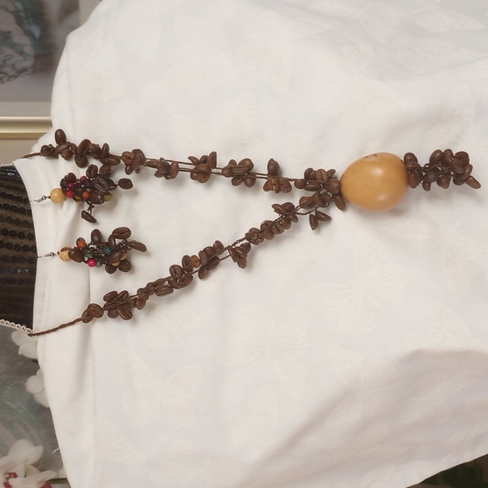 NWOT Tagua Nut ,Coffee beans and Acai beads Necklace and earrings.